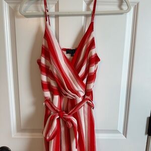 Red and white romper with adjustable straps and sash tie - Size medium